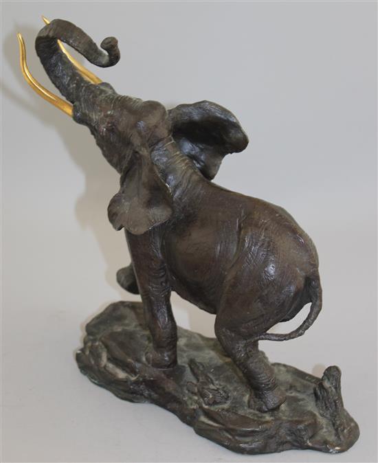 A 20th century patinated bronze elephant, 9.5in.